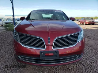 2013 Lincoln MKS z VIN 1LNHL9DK2DG618326, wystawiony jako Copart lot #56875965 z przebiegiem 150 812 mil mil oraz Szkoda całkowita • Salvage title. Historia ofert i sprzedaży dostępna na DreamBid. Obrazek 5.