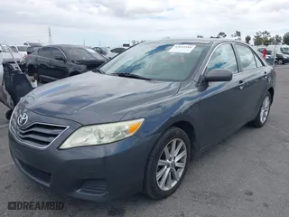 2010 Toyota Camry with VIN 4T1BF3EK5AU068156, listed as a IAAI auction lot 42035585 with 221,889 mi miles. Bid and sale history available at carsss.com. Image 2.