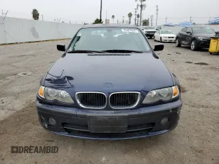2003 BMW 3 Series 330i with VIN WBAEV53413KM30841, listed as a Copart auction lot 76407924 with 121,102 mi miles and Salvage Title. Bid and sale history available at carsss.com. Image 5.