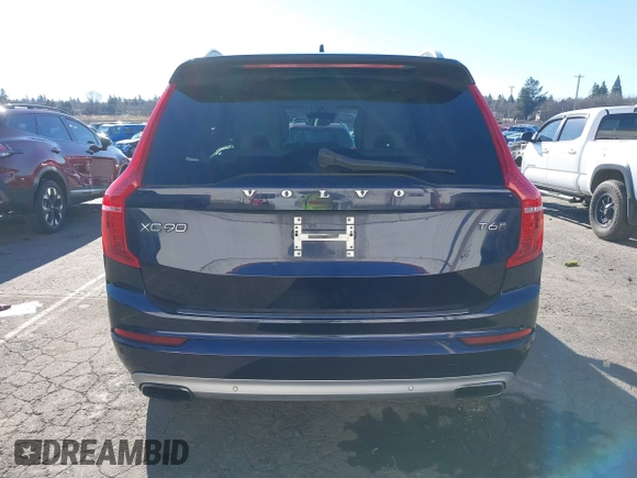 2017 Volvo XC90 Momentum with VIN YV4A22PK3H1116166, listed as a IAAI auction lot 41543940 with 104,879 mi miles. Bid and sale history available at carsss.com. Image 16.