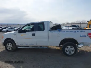 2014 Ford F-150 XL with VIN 1FTFX1EF2EKE26115, listed as a IAAI auction lot 41949049 with 118,404 mi miles. Bid and sale history available at carsss.com. Image 14.