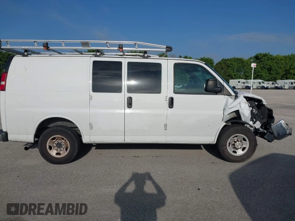 2019 Chevrolet Express Cargo Van with VIN 1GCWGAFG5K1254736, listed as a IAAI auction lot 41880050 with 136,132 mi miles. Bid and sale history available at carsss.com. Image 14.