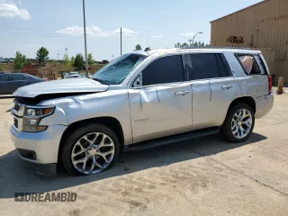2015 Chevrolet Tahoe LT with VIN 1GNSCBKCXFR300885, listed as a Copart auction lot 58851795 with 163,430 mi miles and Salvage title. Bid and sale history available at DreamBid. Image 1.