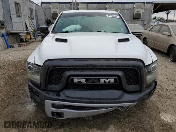 2018 Ram 1500 Rebel with VIN 1C6RR7YT7JS235965, listed as a Copart auction lot 84749674 with 61,484 mi miles and Salvage title. Bid and sale history available at DreamBid. Image 5.