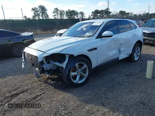 2020 Jaguar F-Pace 25t Premium with VIN SADCJ2FX3LA645447, listed as a IAAI auction lot 41228606 with 28,273 mi miles and . Bid and sale history available at DreamBid. Image 2.