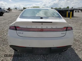 2015 Lincoln MKZ Hybrid z VIN 3LN6L2LU5FR626515, wystawiony jako Copart lot #55239255 z przebiegiem 143 117 mil mil oraz Szkoda całkowita • Salvage title. Historia ofert i sprzedaży dostępna na DreamBid. Obrazek 6.