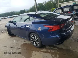 2016 Nissan Maxima Platinum with VIN 1N4AA6AP4GC417412, listed as a Copart auction lot 61597005 with 59,932 mi miles and Salvage title. Bid and sale history available at DreamBid. Image 2.