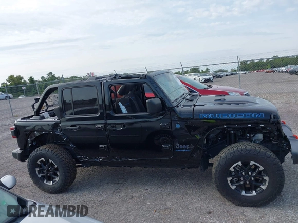 2024 Jeep Wrangler Rubicon X z VIN 1C4RJXR64RW197186, wystawiony jako IAAI lot #42405700 z przebiegiem 6 397 mil mil oraz . Historia ofert i sprzedaży dostępna na DreamBid. Obrazek 13.