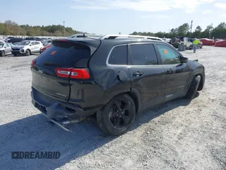 2014 Jeep Cherokee Limited with VIN 1C4PJLDS6EW114842, listed as a IAAI auction lot 41735395 with 157,261 mi miles and . Bid and sale history available at DreamBid. Image 4.