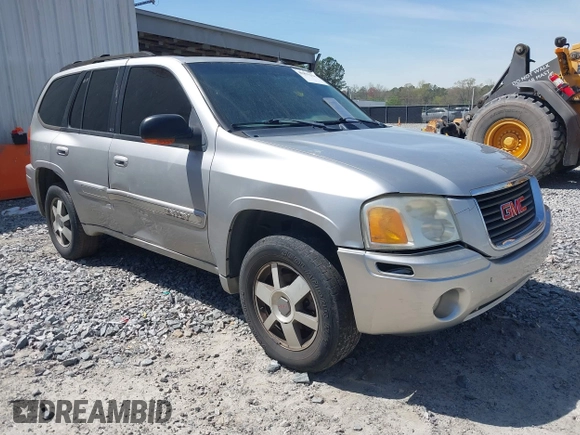 2005 GMC Envoy SLE with VIN 1GKDS13S652390259, listed as a IAAI auction lot 41825258 with 162,172 mi miles and . Bid and sale history available at DreamBid. Image 1.