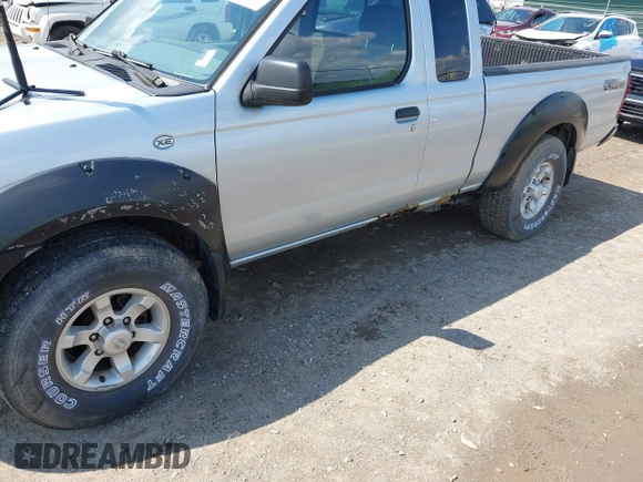 2001 Nissan Frontier SE Desert Runner z VIN 1N6ED26T61C303868, wystawiony jako IAAI lot #42698412 z przebiegiem 223 551 mil mil oraz . Historia ofert i sprzedaży dostępna na DreamBid. Obrazek 6.