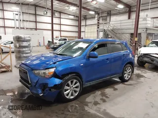 2015 Mitsubishi Outlander SE with VIN 4A4AR4AU1FE054804, listed as a IAAI auction lot 42325699 with 106,680 mi miles and . Bid and sale history available at DreamBid. Image 19.