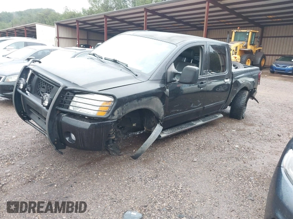 2007 Nissan Titan SE with VIN 1N6BA07A17N212890, listed as a IAAI auction lot 41034412 with 211,881 mi miles and . Bid and sale history available at DreamBid. Image 2.