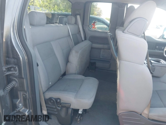 2005 Ford F-150 XLT with VIN 1FTPX14585NB56142, listed as a IAAI auction lot 42168338 with 208,074 mi miles. Bid and sale history available at carsss.com. Image 8.