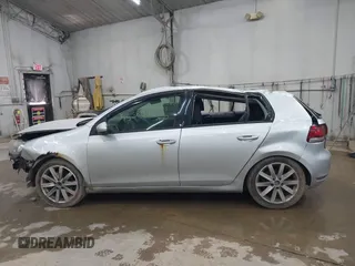 2012 Volkswagen Golf TDI with VIN WVWNM7AJ8CW333137, listed as a IAAI auction lot 42585466 with 213,587 mi miles and . Bid and sale history available at DreamBid. Image 14.