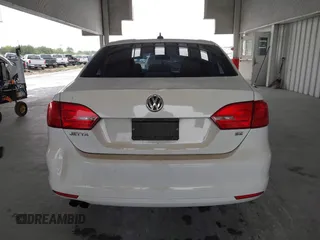 2014 Volkswagen Jetta SE z VIN 3VWD17AJ3EM265396, wystawiony jako IAAI lot #42434771 z przebiegiem 114 931 mil mil oraz . Historia ofert i sprzedaży dostępna na DreamBid. Obrazek 16.