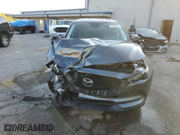 2019 Mazda CX-5 Grand Touring with VIN JM3KFBDM9K0676795, listed as a Copart auction lot 52129885 with 71,869 mi miles and Salvage Title. Bid and sale history available at carsss.com. Image 5.