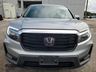2023 Honda Ridgeline RTL-E with VIN 5FPYK3F70PB018858, listed as a Copart auction lot 64210205 with 16,562 mi miles and Salvage title. Bid and sale history available at DreamBid. Image 5.