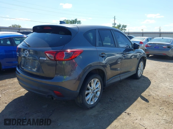 2014 Mazda CX-5 Grand Touring with VIN JM3KE2DY8E0383206, listed as a IAAI auction lot 40205756 with 120,231 mi miles. Bid and sale history available at carsss.com. Image 4.