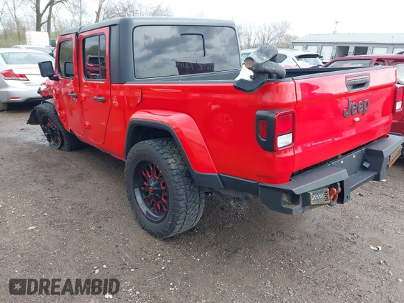 2021 Jeep Gladiator Freedom z VIN 1C6HJTAG0ML547293, wystawiony jako IAAI lot #41926067 z przebiegiem 57 696 mil mil oraz . Historia ofert i sprzedaży dostępna na DreamBid. Obrazek 3.