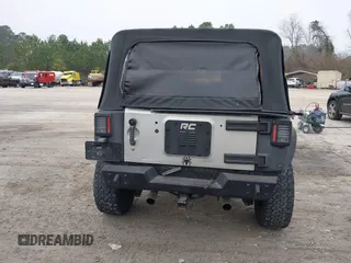 2007 Jeep Wrangler Unlimited X with VIN 1J4GA391X7L107424, listed as a IAAI auction lot 41752013 with 196,557 mi miles and . Bid and sale history available at DreamBid. Image 16.