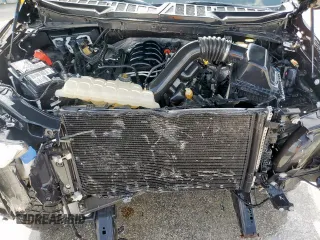 2021 Ford F-150 XL с VIN 1FTFW1E5XMFB70288, выставлен на аукционе Copart как лот 87917535 с пробегом 35 111 миль миль и Списание • Salvage title. История ставок и продаж доступна на DreamBid. Изображение 11.
