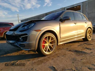 2013 Porsche Cayenne GTS with VIN WP1AD2A22DLA74169, listed as a Copart auction lot 87249564 with 95,713 mi miles and Salvage Title. Bid and sale history available at DreamBid. Image 1.