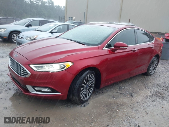 2018 Ford Fusion Titanium with VIN 3FA6P0D91JR233679, listed as a IAAI auction lot 42182140 with 100,706 mi miles and . Bid and sale history available at DreamBid. Image 2.