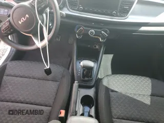 2023 Kia Rio S with VIN 3KPA24AD3PE603095, listed as a Copart auction lot 74014854 with Not Provided miles and Salvage Title. Bid and sale history available at DreamBid. Image 8.
