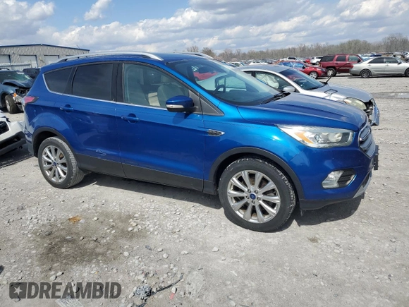 2017 Ford Escape Titanium with VIN 1FMCU9J9XHUA93760, listed as a Copart auction lot 50472375 with 104,247 mi miles and Salvage Title. Bid and sale history available at carsss.com. Image 4.