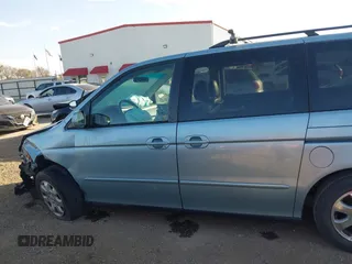2003 Honda Odyssey EX-L with VIN 5FNRL18983B071606, listed as a IAAI auction lot 41783246 with 271,028 mi miles and . Bid and sale history available at DreamBid. Image 14.