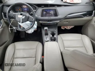 2019 Cadillac XT4 FWD Premium Luxury z VIN 1GYFZCR48KF141027, wystawiony jako Copart lot #52810535 z przebiegiem 18 295 mil mil oraz Szkody całkowita. Historia ofert i sprzedaży dostępna na DreamBid. Obrazek 8.