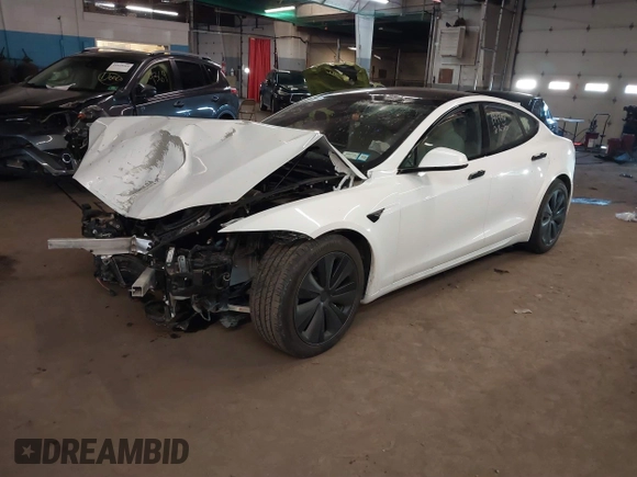 2022 Tesla Model S z VIN 5YJSA1E59NF493914, wystawiony jako IAAI lot #41626020 z przebiegiem Nie podano mil oraz . Historia ofert i sprzedaży dostępna na DreamBid. Obrazek 17.