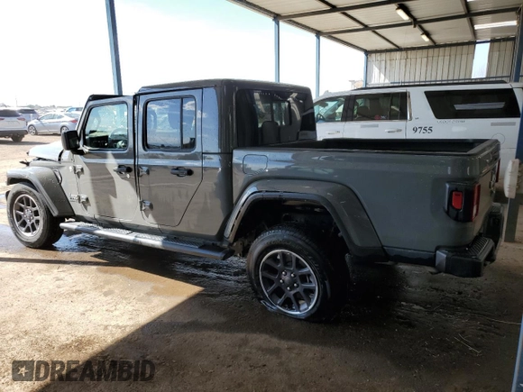 2023 Jeep Gladiator Overland with VIN 1C6HJTFG2PL542657, listed as a Copart auction lot 63384465 with 29,728 mi miles and Non repairable. Bid and sale history available at DreamBid. Image 2.
