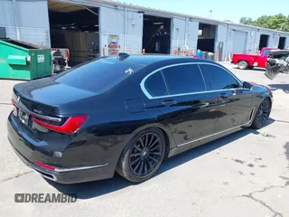 2020 BMW 7 Series 740i xDrive with VIN WBA7T4C03LGF97293, listed as a IAAI auction lot 40189953 with 64,936 mi miles and . Bid and sale history available at DreamBid. Image 4.