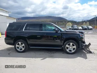 2017 Chevrolet Tahoe LT with VIN 1GNSKBKC5HR233537, listed as a IAAI auction lot 42051281 with 102,778 mi miles and . Bid and sale history available at DreamBid. Image 13.