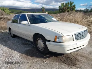 1999 Cadillac DeVille z VIN 1G6KD54Y2XU785069, wystawiony jako IAAI lot #41630447 z przebiegiem 137 007 mil mil oraz . Historia ofert i sprzedaży dostępna na DreamBid. Obrazek 1.