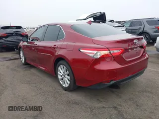 2020 Toyota Camry LE with VIN 4T1C11AK0LU954420, listed as a IAAI auction lot 41576657 with 56,863 mi miles. Bid and sale history available at carsss.com. Image 3.