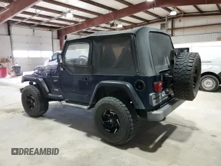 2002 Jeep Wrangler Sport with VIN 1J4FA49S82P703420, listed as a Copart auction lot 53322175 with 87,642 mi miles and Salvage Title. Bid and sale history available at carsss.com. Image 2.