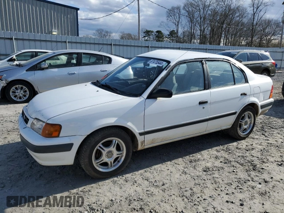 1997 Toyota Tercel DX z VIN JT2BC52L5V0215622, wystawiony jako Copart lot #87475544 z przebiegiem 382 242 mil mil oraz Szkoda całkowita • Salvage title. Historia ofert i sprzedaży dostępna na DreamBid. Obrazek 1.