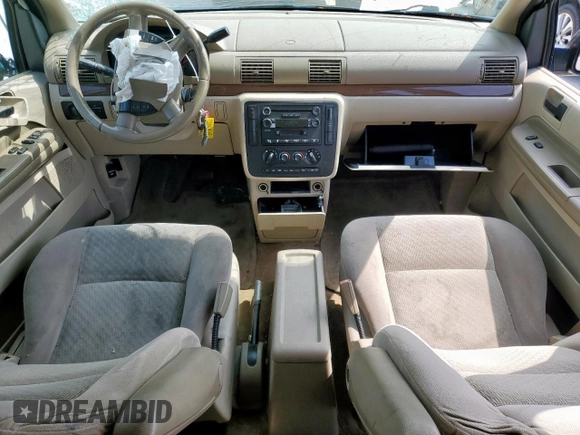 2004 Ford Freestar SEL z VIN 2FMZA52214BA84555, wystawiony jako Copart lot #54569535 z przebiegiem Nie podano mil oraz Szkoda całkowita • Salvage title. Historia ofert i sprzedaży dostępna na DreamBid. Obrazek 8.