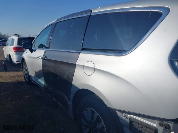 2023 Chrysler Pacifica Hybrid Limited with VIN 2C4RC1S72PR588627, listed as a IAAI auction lot 42063631 with 52,799 mi miles. Bid and sale history available at carsss.com. Image 18.