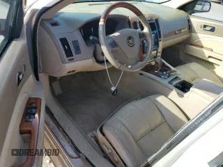 2007 Cadillac STS z VIN 1G6DW677970151227, wystawiony jako Copart lot #52345265 z przebiegiem 154 790 mil mil oraz Szkoda całkowita • Salvage title. Historia ofert i sprzedaży dostępna na DreamBid. Obrazek 8.