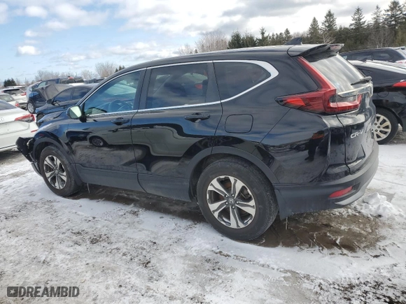 2021 Honda CR-V LX with VIN 2HKRW1H2XMH002297, listed as a Copart auction lot 44989105 with 80,057 mi miles and Salvage Title. Bid and sale history available at carsss.com. Image 2.