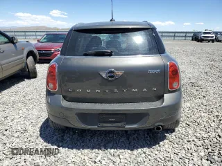 2014 MINI Countryman with VIN WMWZB3C56EWR38919, listed as a Copart auction lot 61385865 with 127,368 mi miles and Salvage title. Bid and sale history available at DreamBid. Image 6.