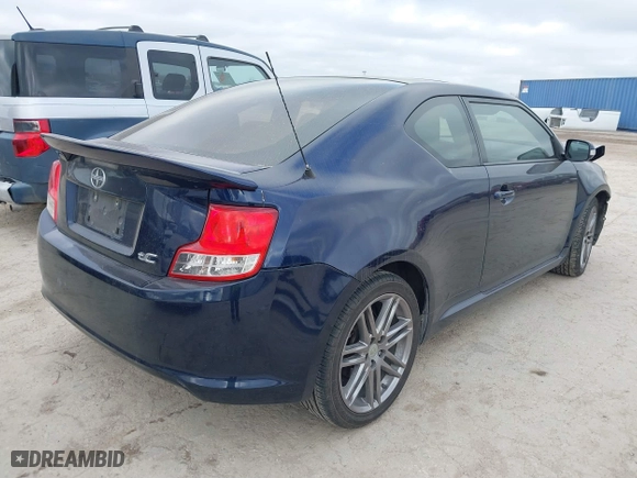 2012 Scion tC with VIN JTKJF5C77C3032626, listed as a IAAI auction lot 41774978 with 177,962 mi miles. Bid and sale history available at carsss.com. Image 4.
