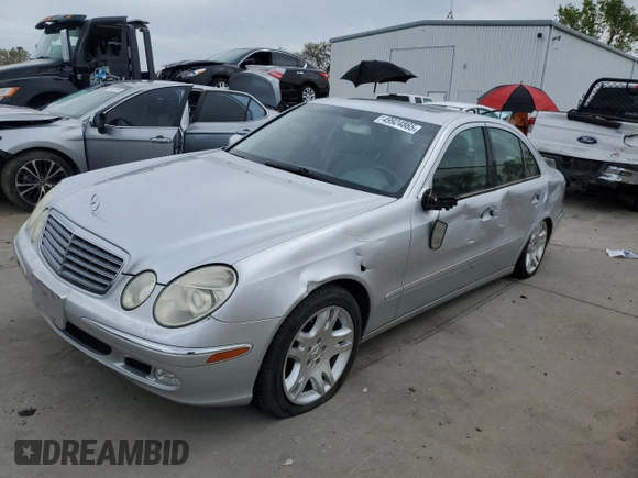 2003 Mercedes-Benz E-Class 5.0L with VIN WDBUF70J03A112909, listed as a Copart auction lot 49924865 with 158,244 mi miles and Salvage Title. Bid and sale history available at carsss.com. Image 1.