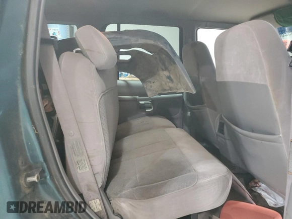 1998 Mercury Mountaineer z VIN 4M2ZU55PXWUJ01704, wystawiony jako Copart lot #50892605 z przebiegiem 196 987 mil mil oraz Szkoda całkowita • Salvage title. Historia ofert i sprzedaży dostępna na DreamBid. Obrazek 11.