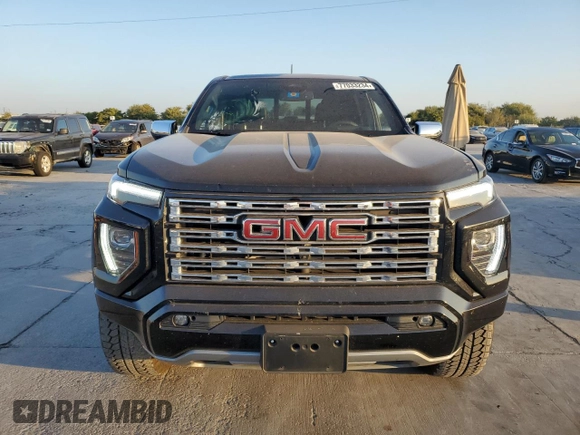 2023 GMC Canyon 4WD Denali with VIN 1GTP6FEK8P1164692, listed as a Copart auction lot 77033234 with 5,644 mi miles and Salvage Title. Bid and sale history available at carsss.com. Image 5.