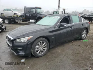 2018 Infiniti Q50 2.0t LUXE with VIN JN1CV7AP7JM241179, listed as a Copart auction lot 86733564 with 99,175 mi miles and Salvage Title. Bid and sale history available at carsss.com. Image 1.